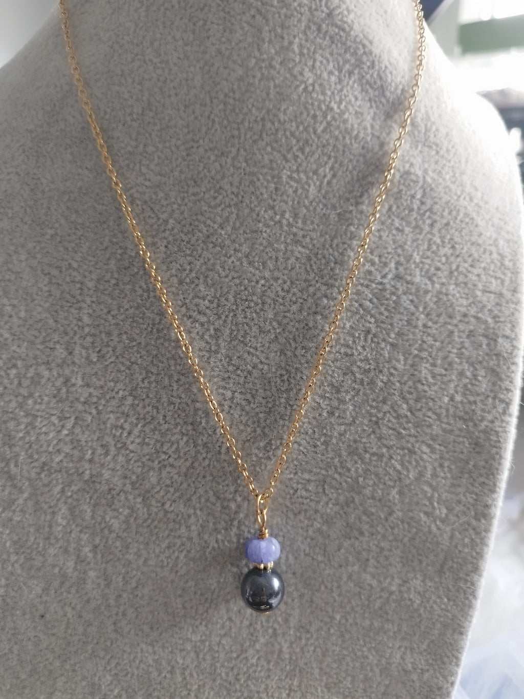 Collier Duo Hématite et Tanzanite - Ancrage et Élévation
