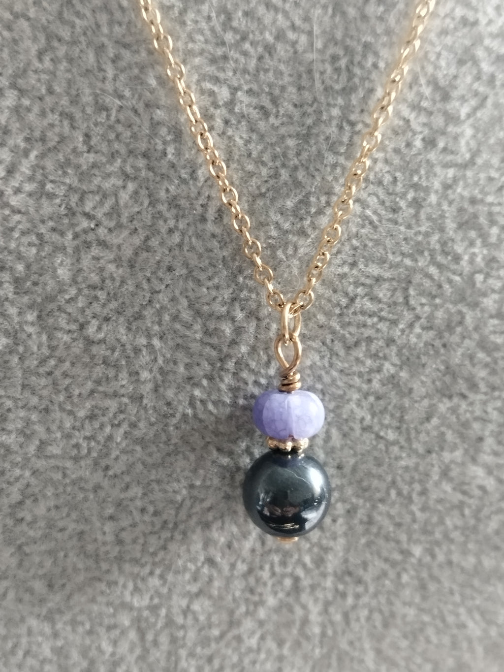 Collier Duo Hématite et Tanzanite - Ancrage et Élévation