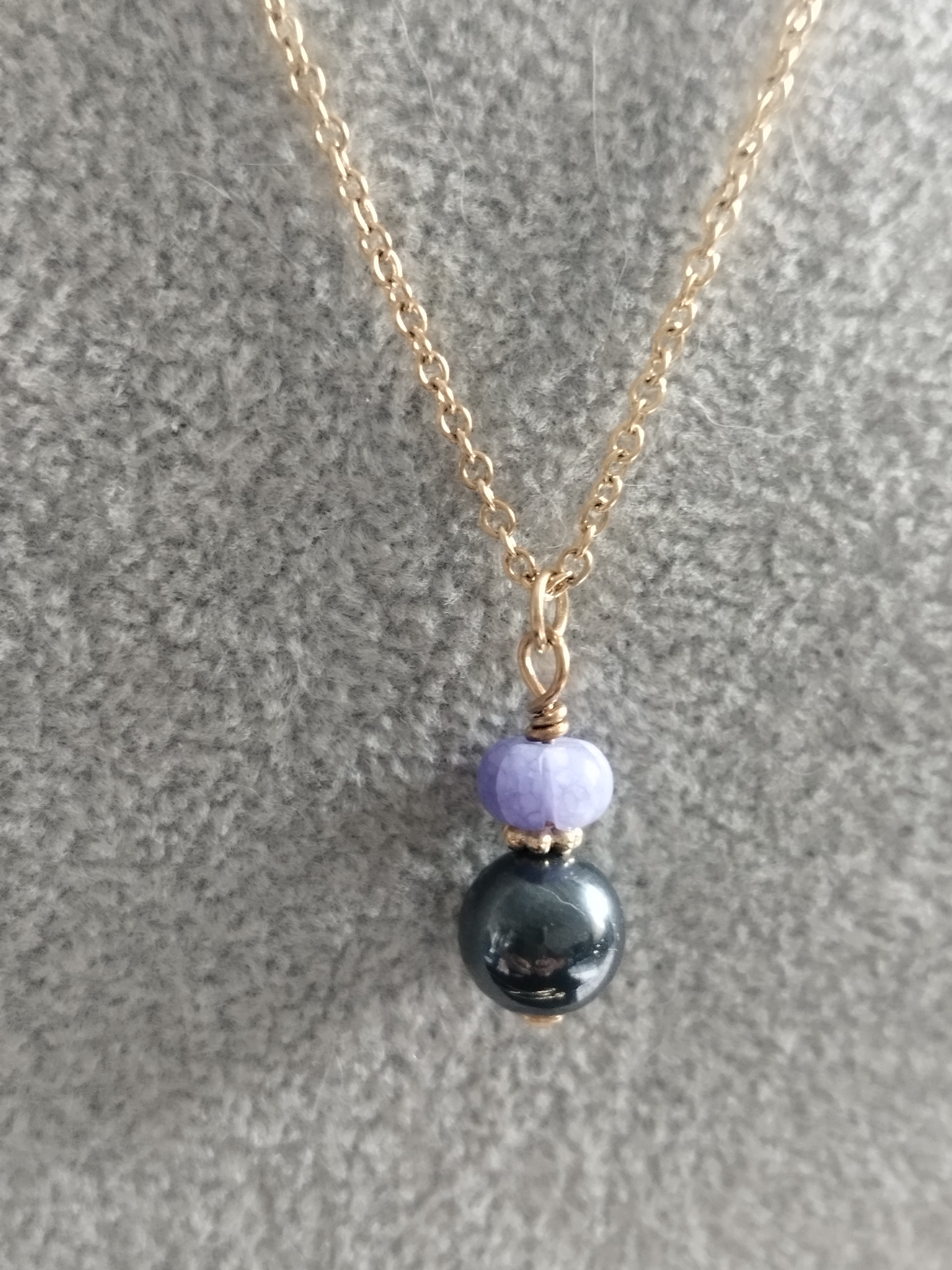 Collier Duo Hématite et Tanzanite - Ancrage et Élévation