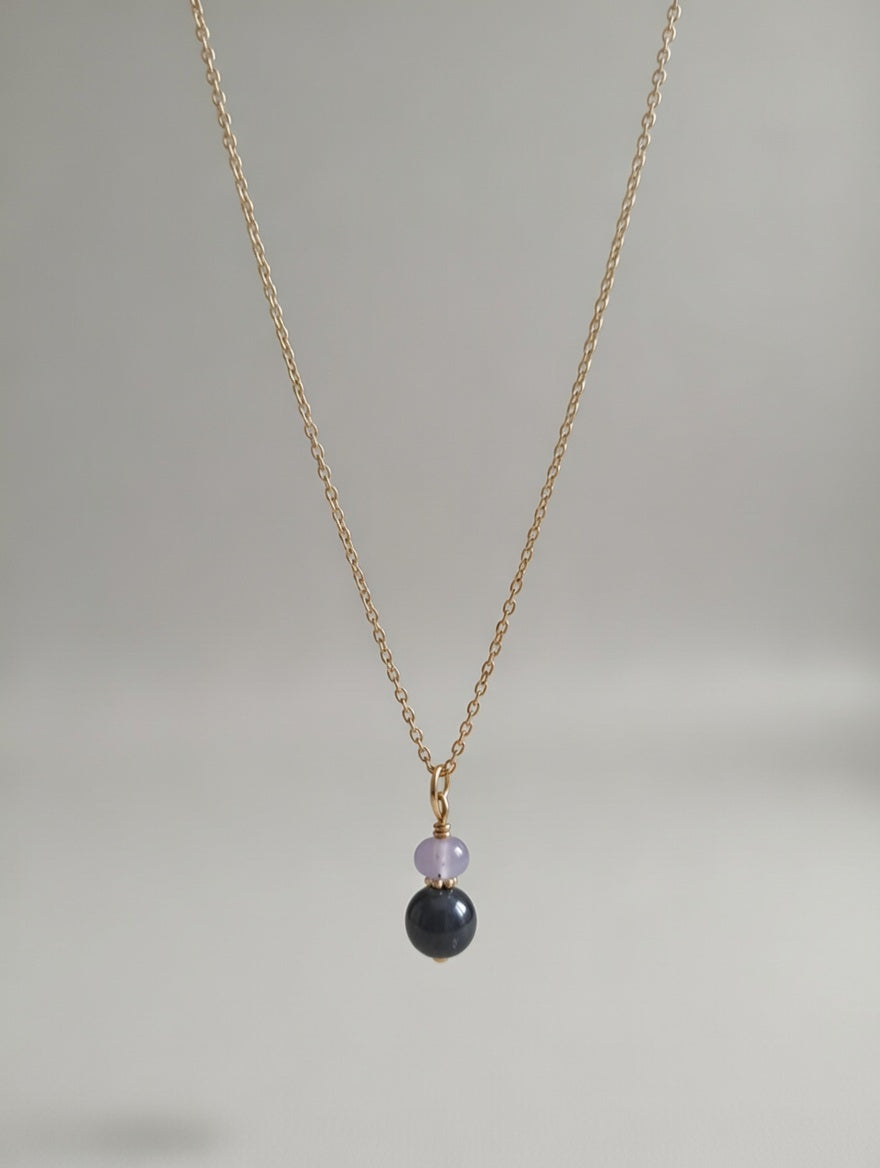 Collier Duo Hématite et Tanzanite - Ancrage et Élévation