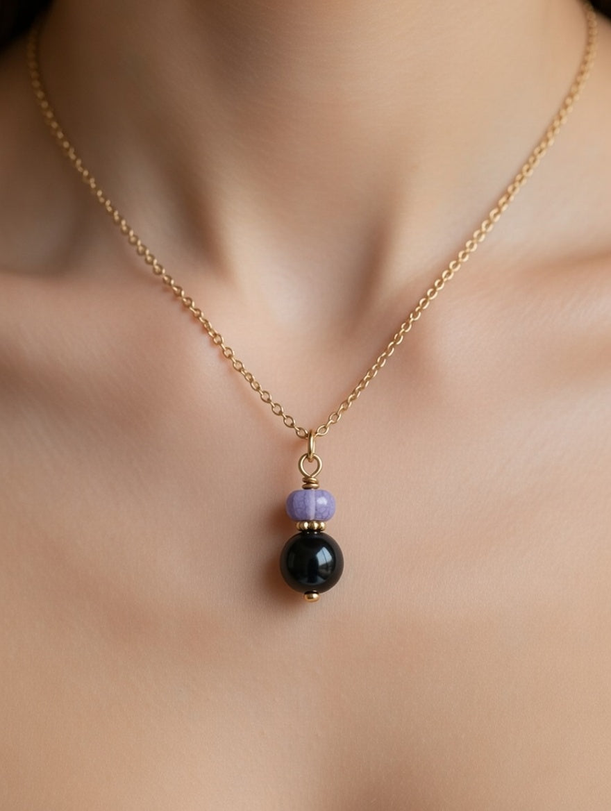 Collier Duo Hématite et Tanzanite - Ancrage et Élévation
